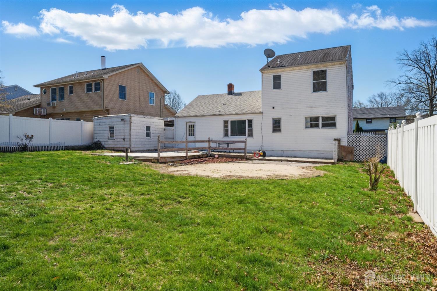 94 South Hill Road Colonia, NJ 07067 - Photo 31 of 31 a view of a house with a yard patio and sitting area
