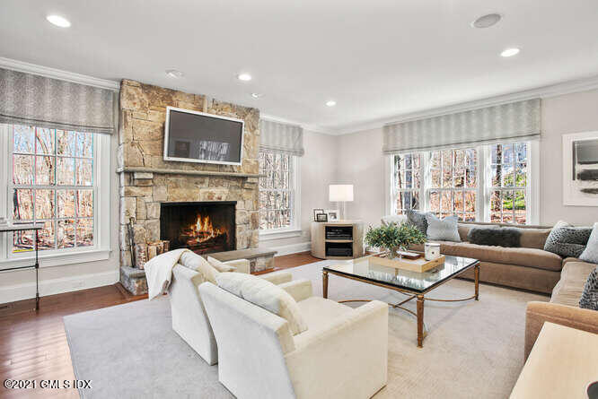 7 Desiree Drive Greenwich, CT 06830 - Photo 17 of 39 a living room with furniture fireplace and window