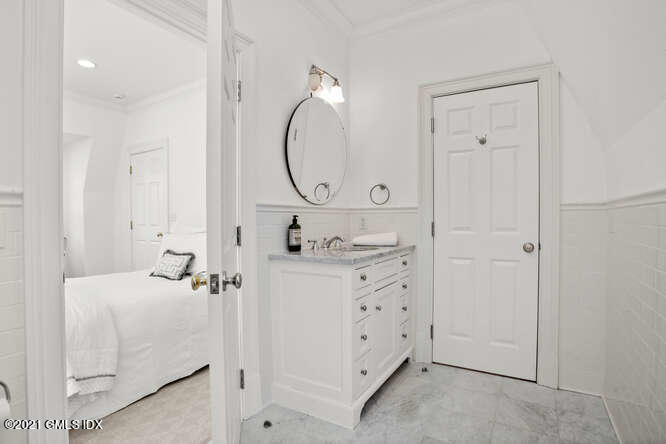 7 Desiree Drive Greenwich, CT 06830 - Photo 24 of 39 a bathroom with a sink vanity and a mirror