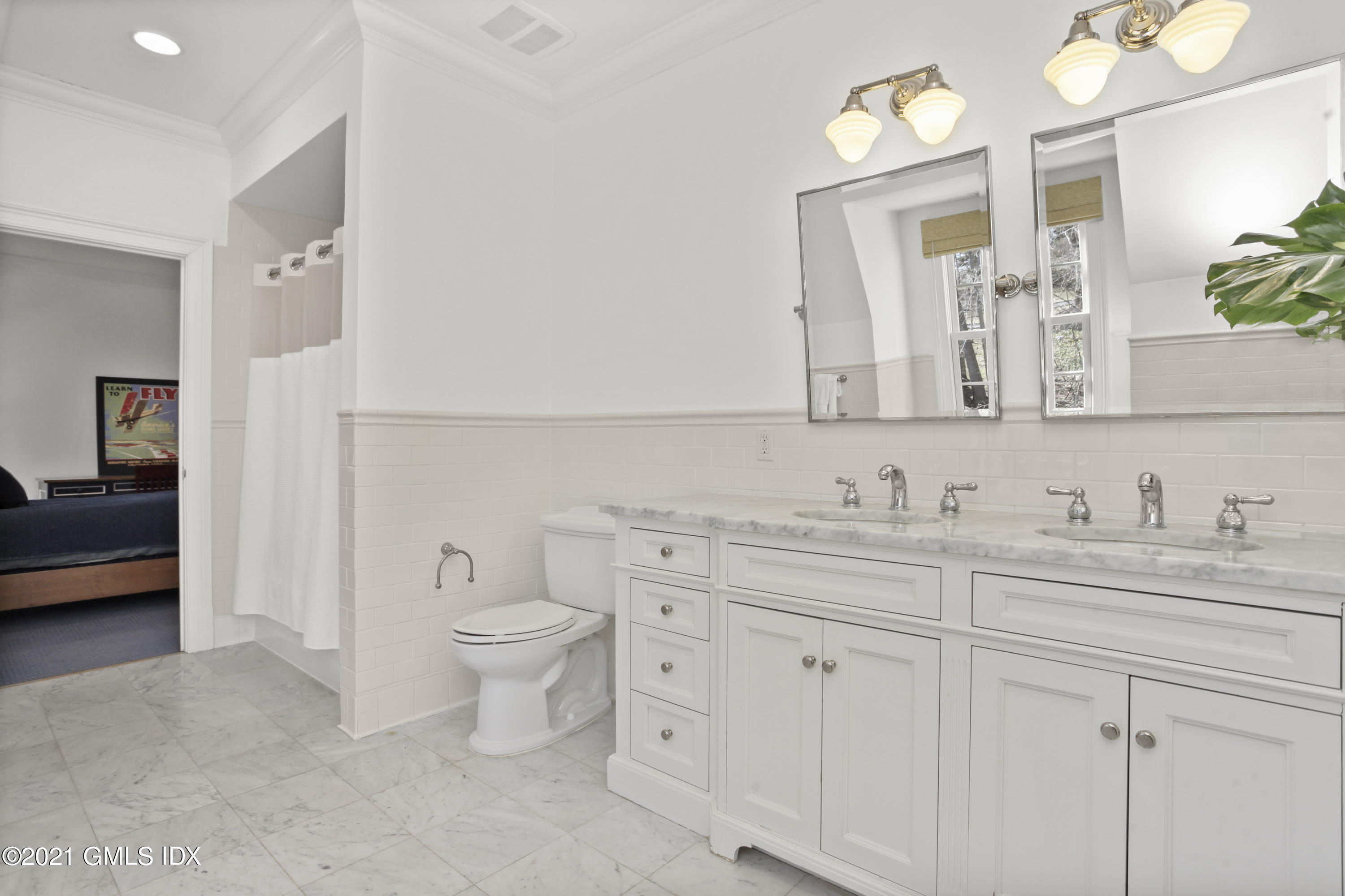 7 Desiree Drive Greenwich, CT 06830 - Photo 26 of 39 a bathroom with a granite countertop toilet sink and mirror