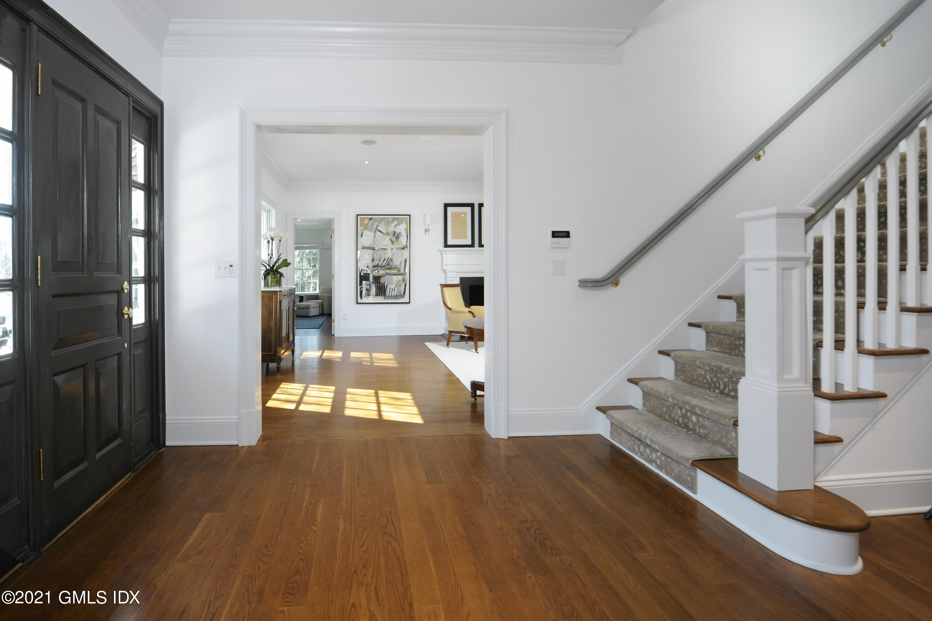 7 Desiree Drive Greenwich, CT 06830 - Photo 4 of 39 a view of entryway and hall with wooden floor