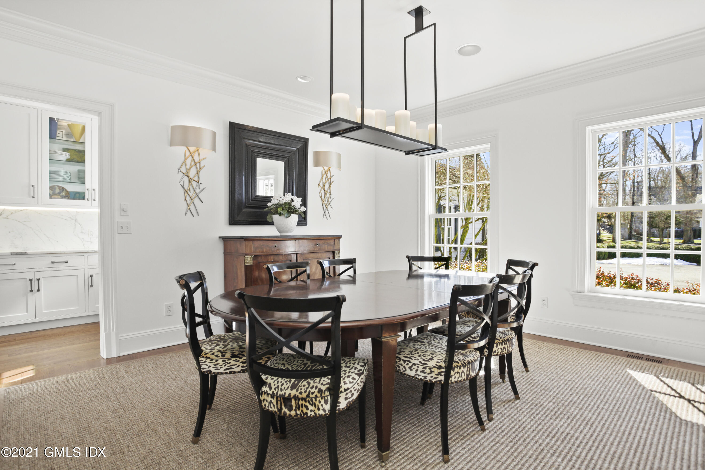 7 Desiree Drive Greenwich, CT 06830 - Photo 10 of 39 a view of a dining room with furniture window and wooden floor