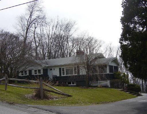 a view of a yard in front of house