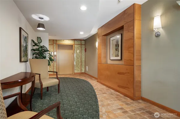 a view of a livingroom with furniture and wooden floor