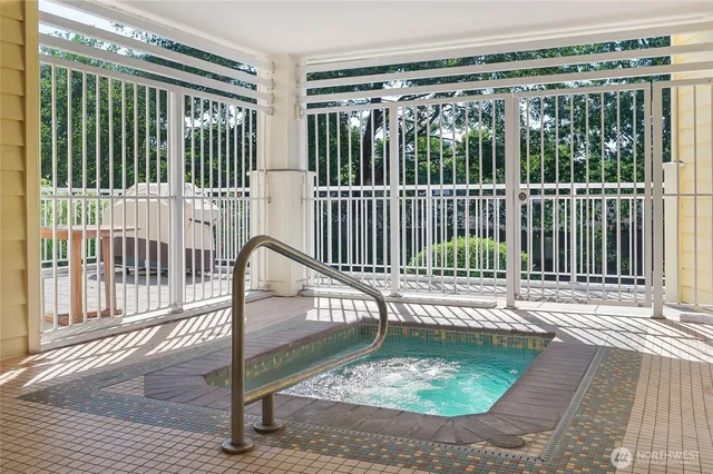 a view of a balcony with a floor to ceiling window