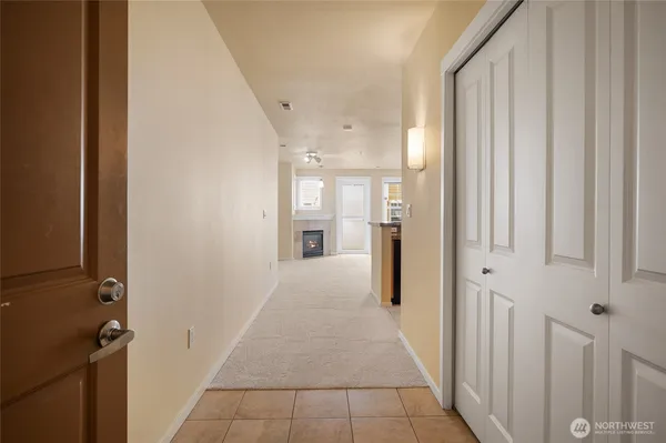a view of a hallway with a furniture