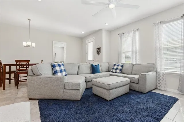 a living room with furniture and a couch