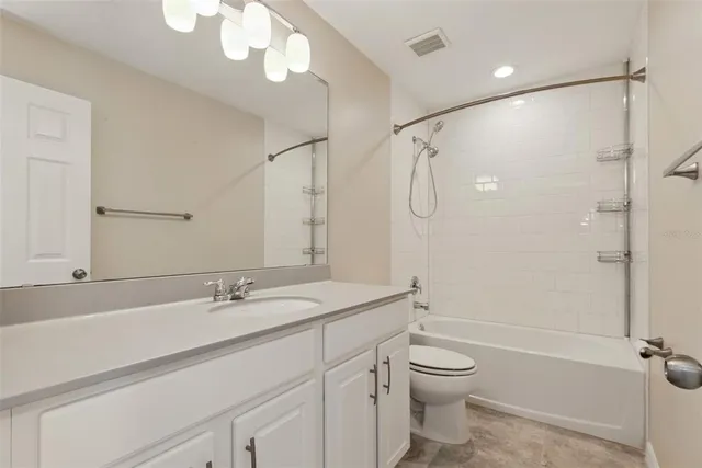 a view of storage and utility room with washer and dryer