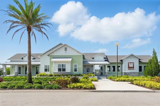 a view of a playground with basketball court