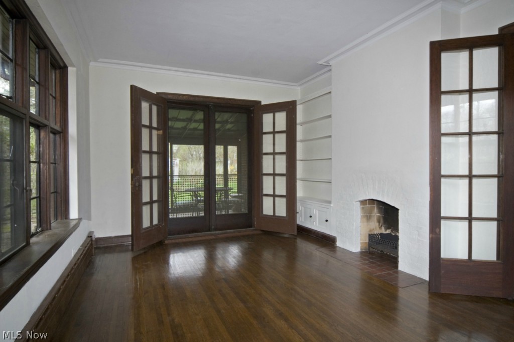 2830 Coventry Road Shaker Heights, OH 44120 - Photo 7 of 24 View of Sunroom/Den with built ins and decorative fireplace