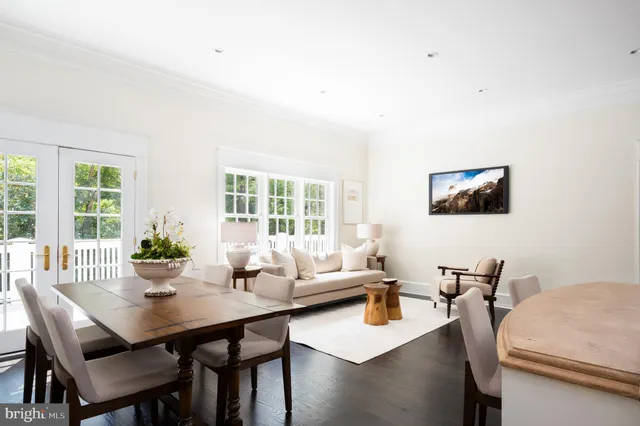 a view of a livingroom with furniture and a flat screen tv