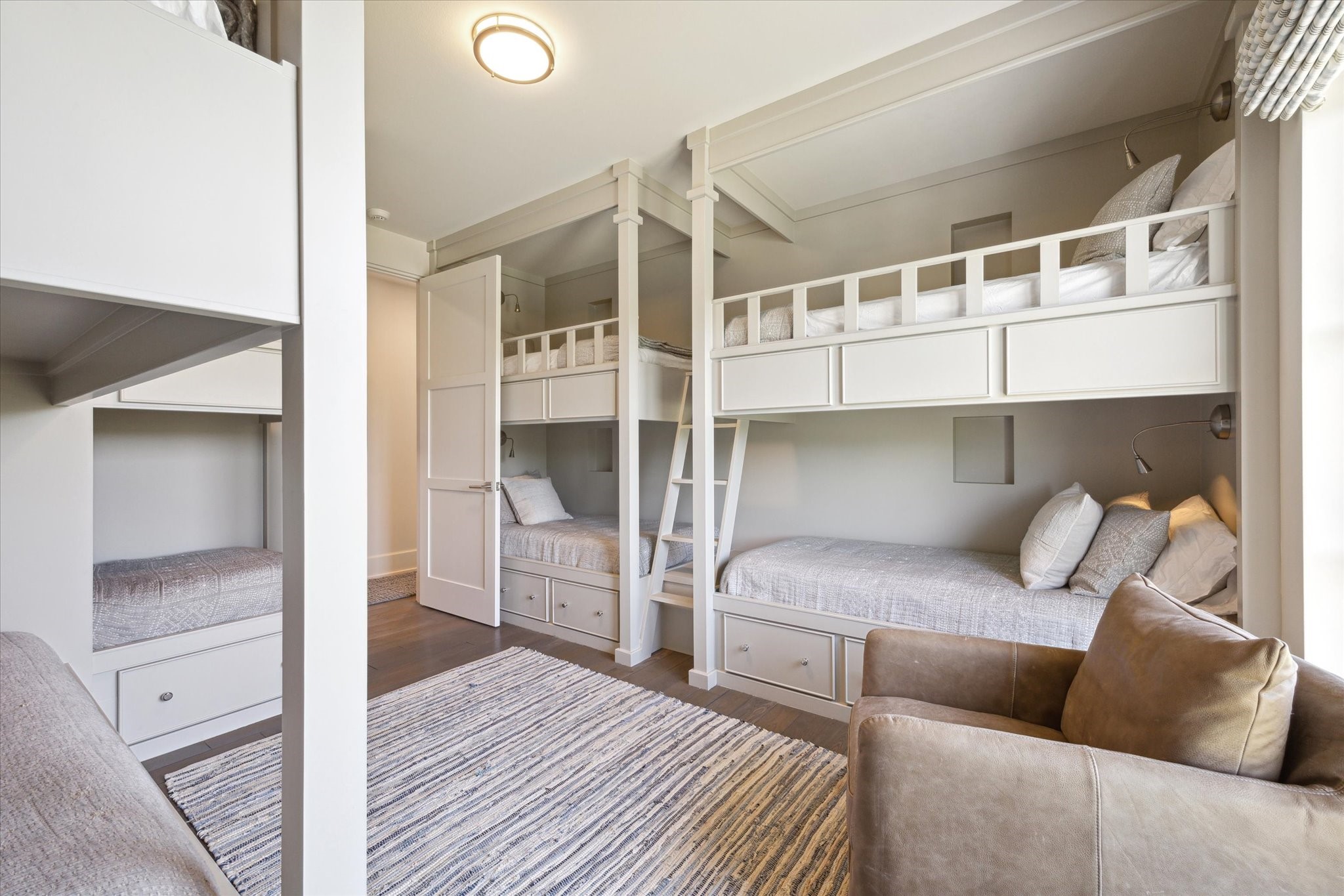 633 Quintana Roo Place Seabrook, TX 77586 - Photo 30 of 47 Bedroom #4 is set up as a fantastic, 8 bed bunk room! Imagine the fun memories to be created here between grandchildren, cousins, siblings, and good friends.