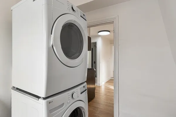 a utility room with dryer and washer