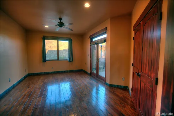 a view of a glass door and a window