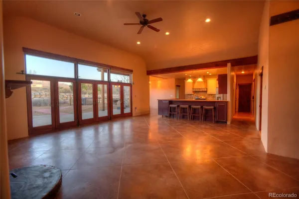 a kitchen with a sink and breakfast area