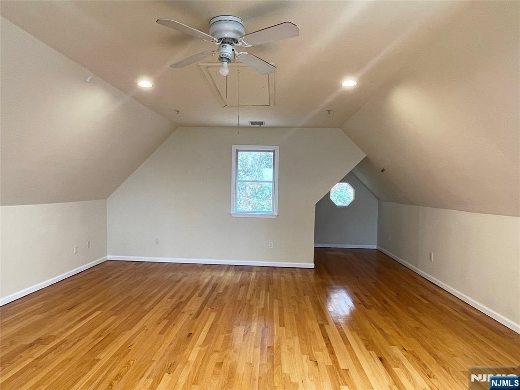 662 Undercliff Avenue, Unit 2 Edgewater, NJ 07020 - Photo 9 of 17 wooden floor in an empty room with a window