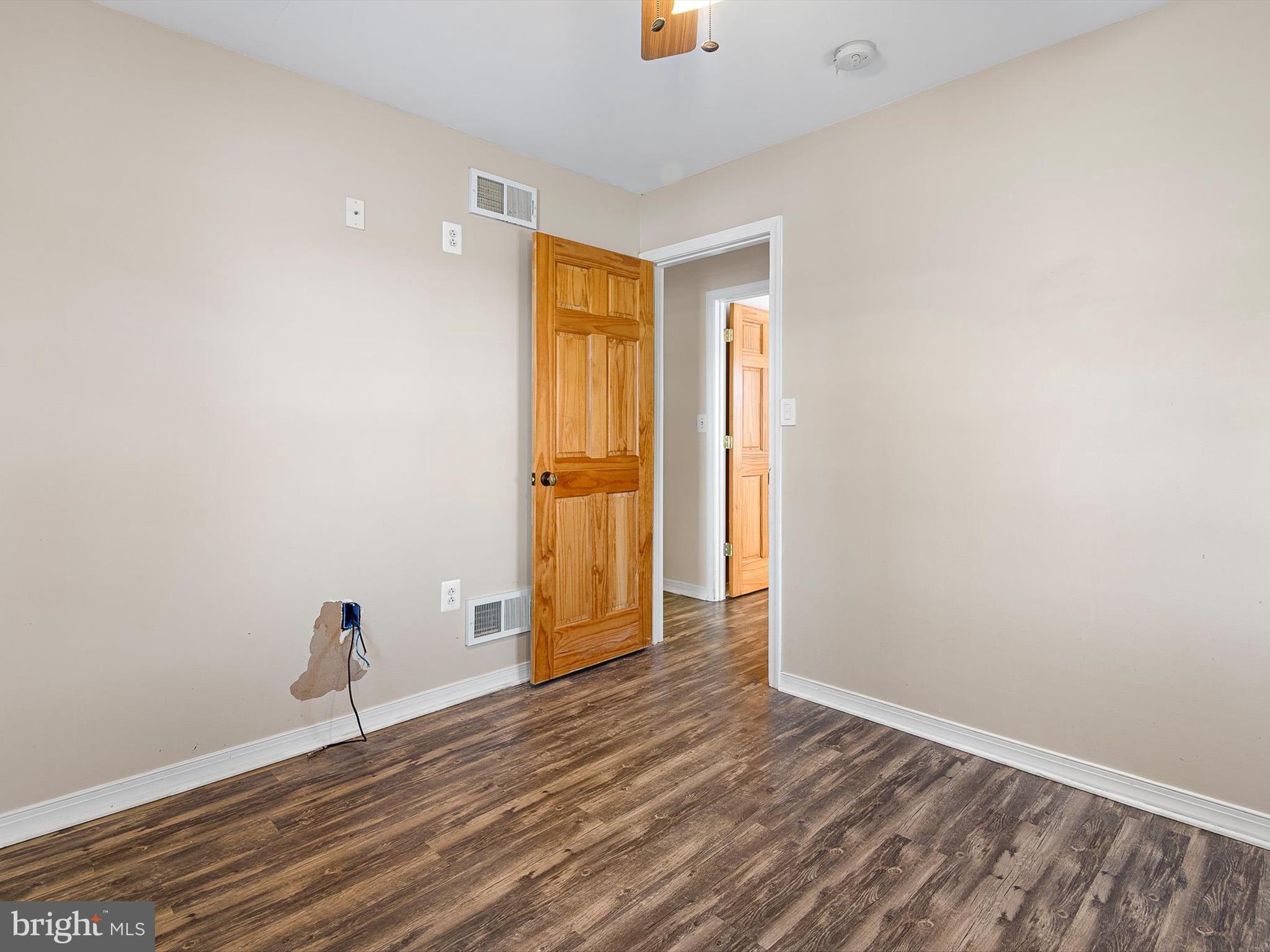 176 Old Mill Road Conowingo, MD 21918 - Photo 16 of 20 a view of empty room with wooden floor