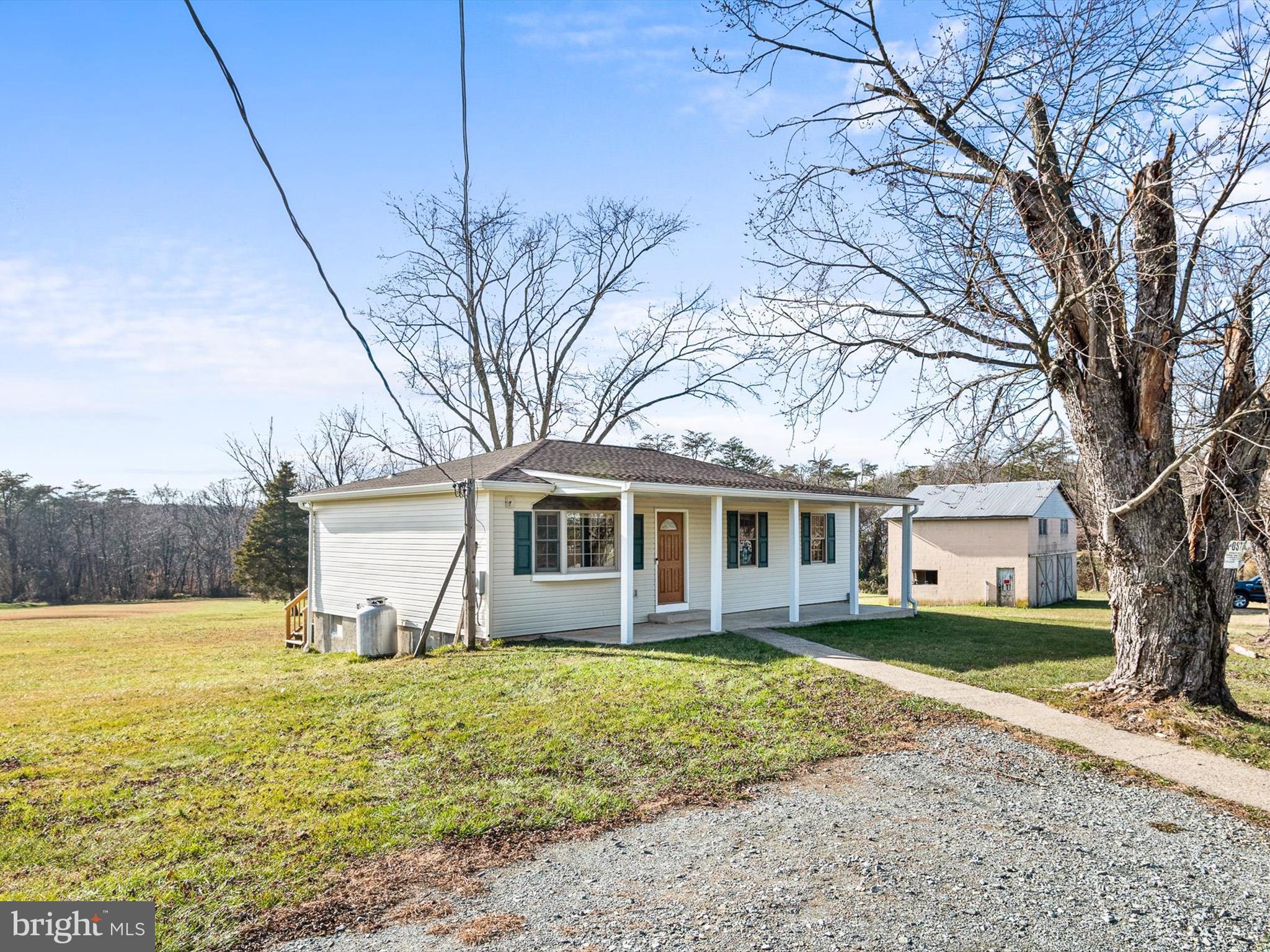 176 Old Mill Road Conowingo, MD 21918 - Photo 2 of 20 a house that has a tree in front of it