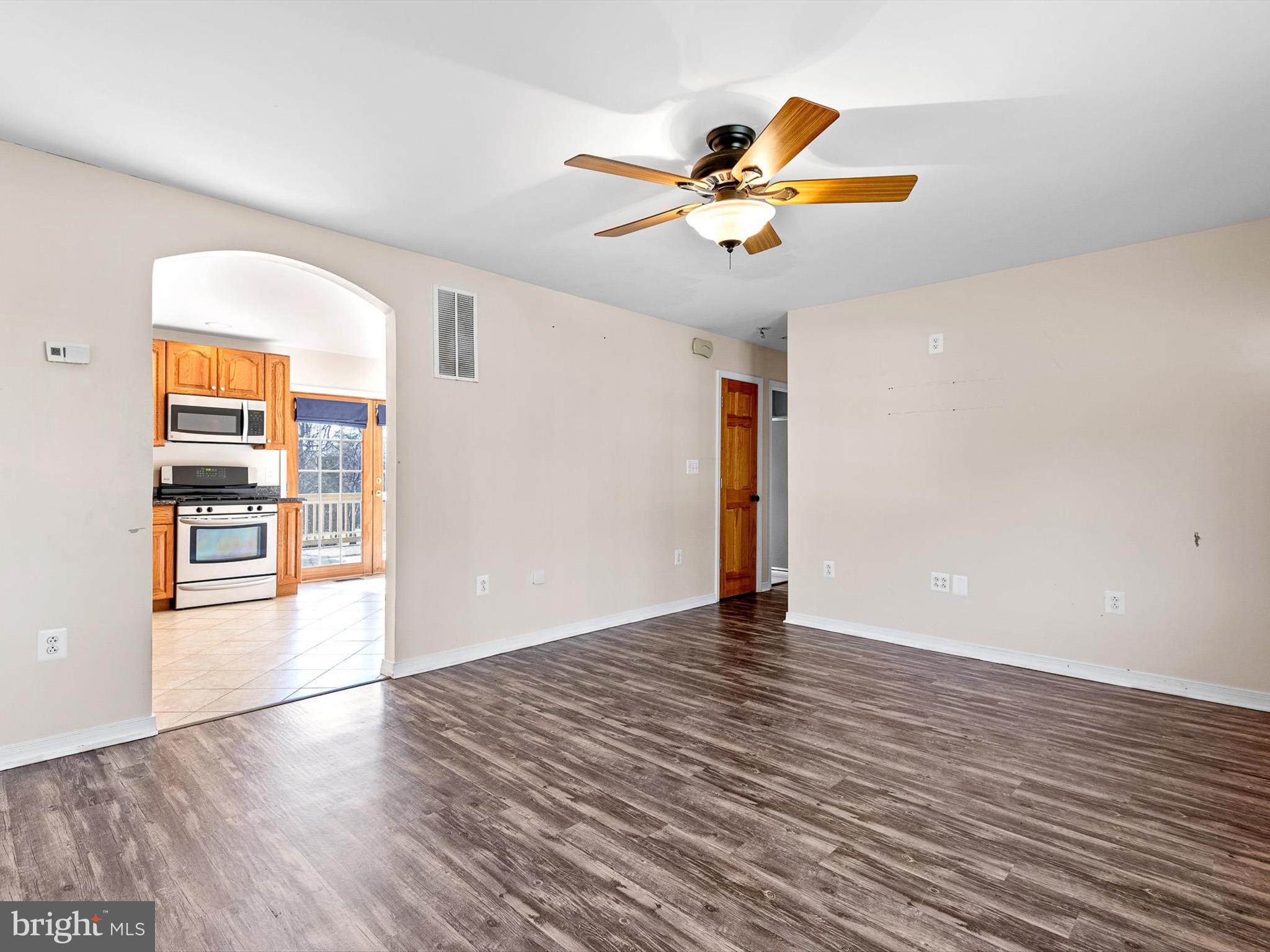 176 Old Mill Road Conowingo, MD 21918 - Photo 6 of 20 a view of empty room with wooden floor