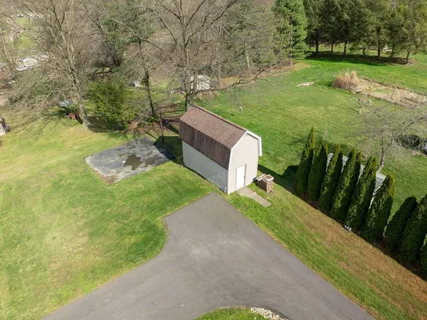 a kitchen with granite countertop stainless steel appliances and wooden cabinets