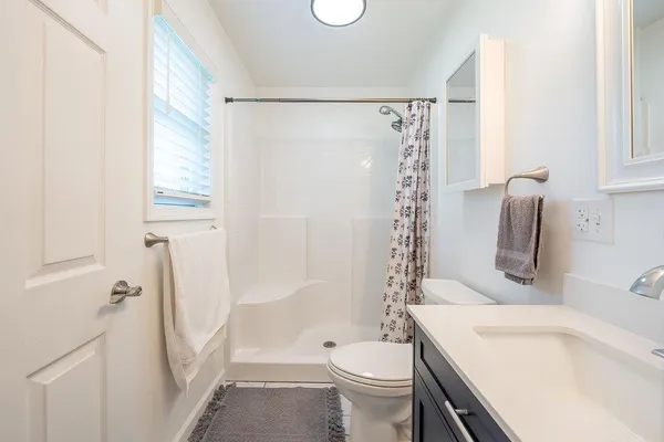 a view of a workspace with furniture