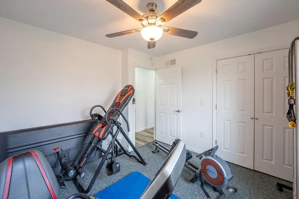 a view of a room with gym equipment
