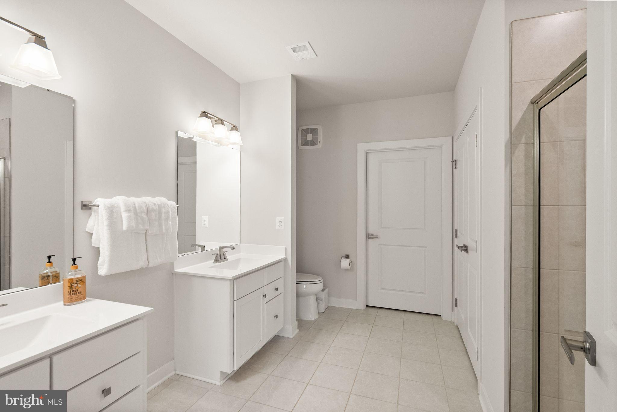 46320 Mount Milstead Terrace, Unit 301 Sterling, VA 20164 - Photo 11 of 24 Sleek and modern bathroom oasis.