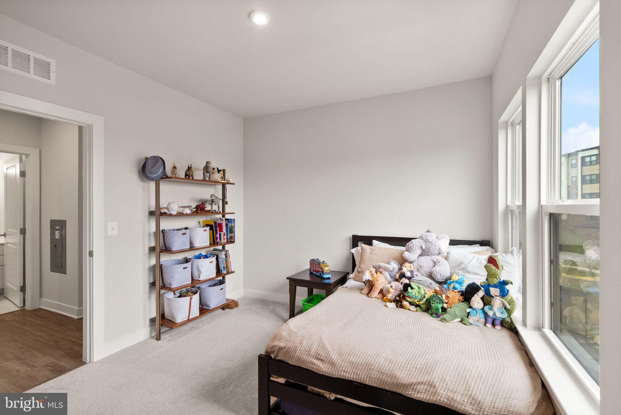 46320 Mount Milstead Terrace, Unit 301 Sterling, VA 20164 - Photo 12 of 24 Bright and cheerful children's bedroom retreat.