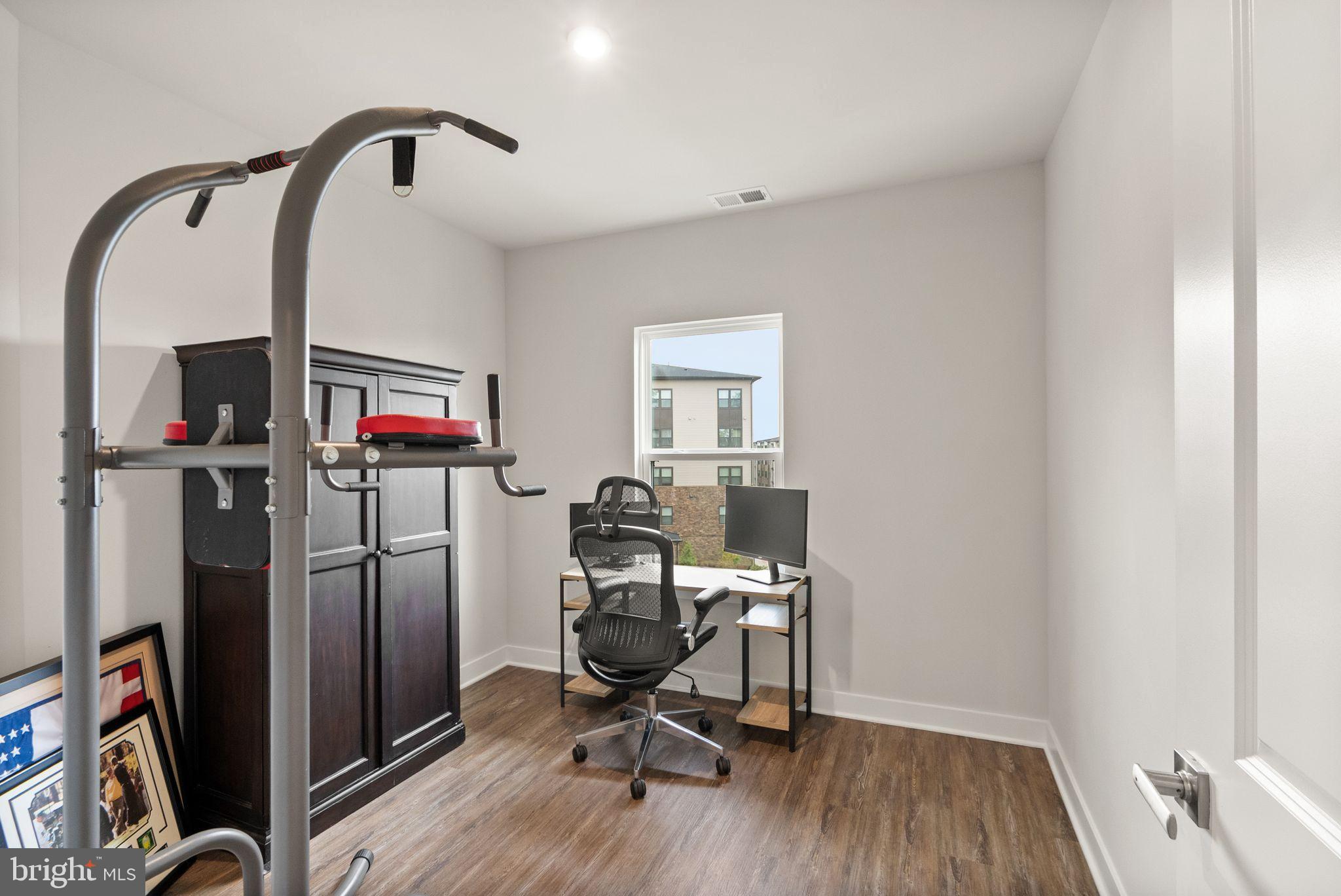 46320 Mount Milstead Terrace, Unit 301 Sterling, VA 20164 - Photo 15 of 24 Versatile space for work and fitness.