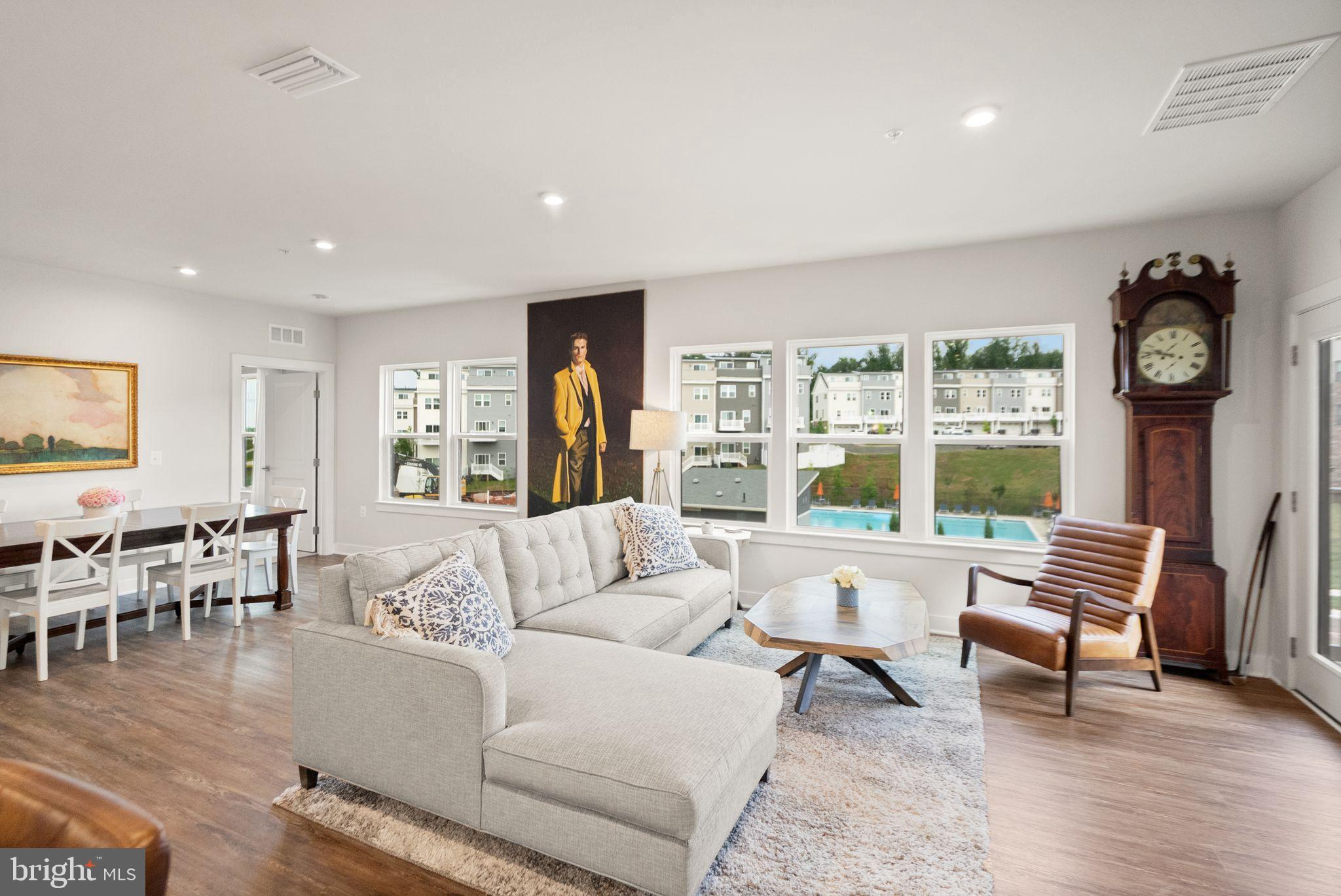 46320 Mount Milstead Terrace, Unit 301 Sterling, VA 20164 - Photo 5 of 24 Bright and airy living space with modern charm.