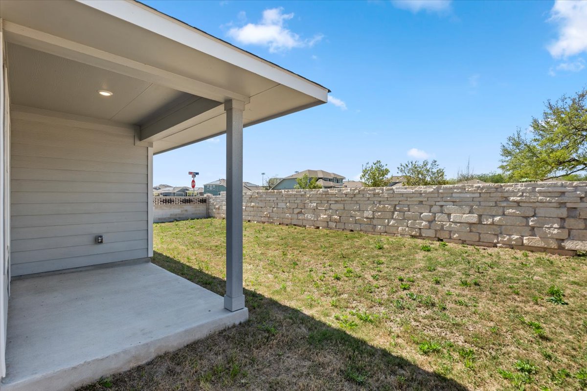 167 Jeffers Kyle, TX 78640 - Photo 2 of 40 Fenced backyard featuring a patio