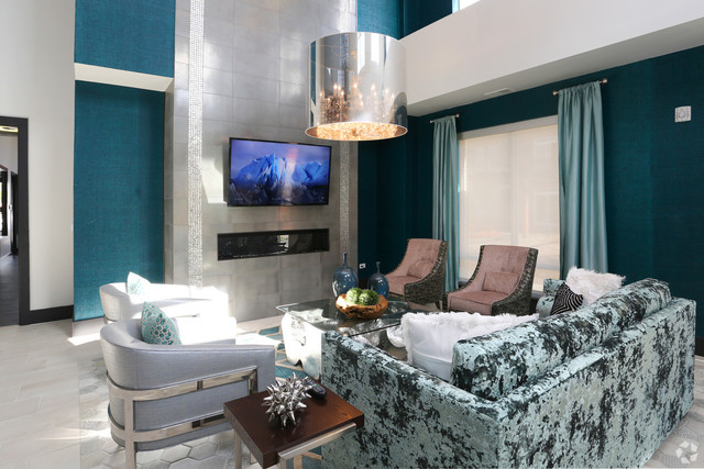 670 East Algonquin Road, Unit 4206 Schaumburg, IL 60173 - Photo 14 of 27 a living room with furniture a chandelier and a window