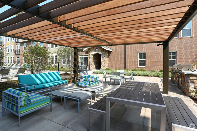 670 East Algonquin Road, Unit 4206 Schaumburg, IL 60173 - Photo 24 of 27 a outdoor space with patio lots of furniture