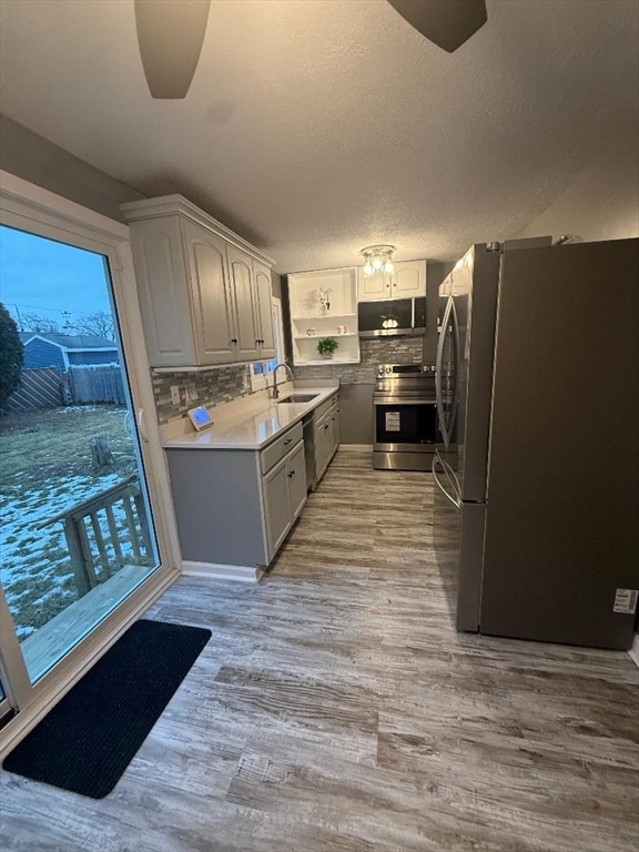 36 Daley Street Chicopee, MA 01013 - Photo 11 of 31 a kitchen with stainless steel appliances granite countertop a refrigerator a stove and a sink