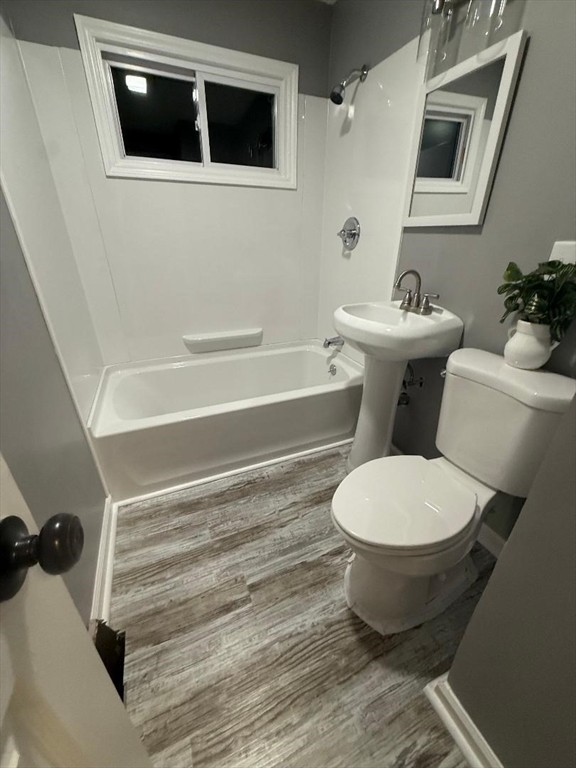 36 Daley Street Chicopee, MA 01013 - Photo 19 of 31 a bathroom with a toilet a sink and bathtub