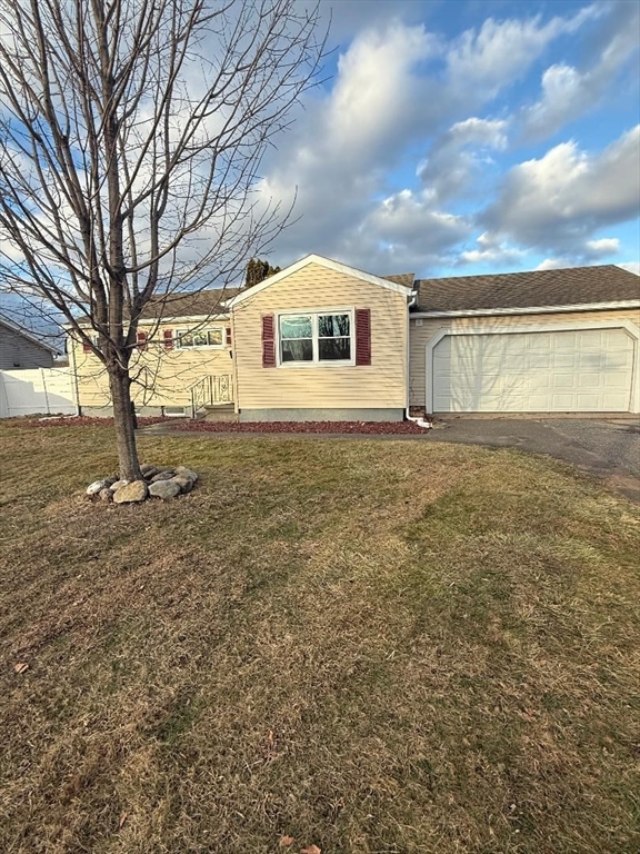 36 Daley Street Chicopee, MA 01013 - Photo 2 of 31 a house view with a garden space