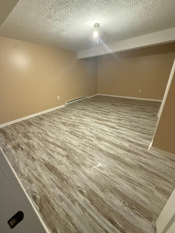 36 Daley Street Chicopee, MA 01013 - Photo 28 of 31 an empty room with wooden floor