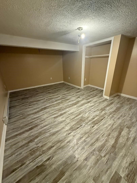 36 Daley Street Chicopee, MA 01013 - Photo 29 of 31 an empty room with wooden floor