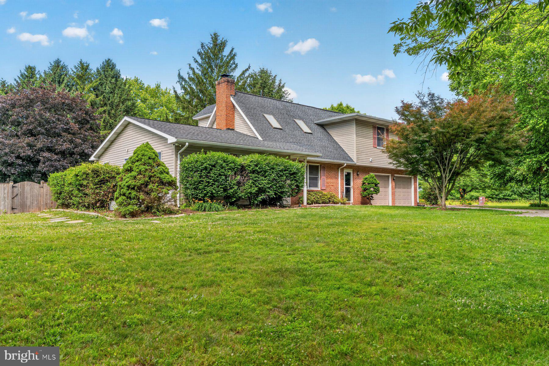 49 Rockland Road Westminster, MD 21158 - Photo 63 of 66 a front view of a house with a yard