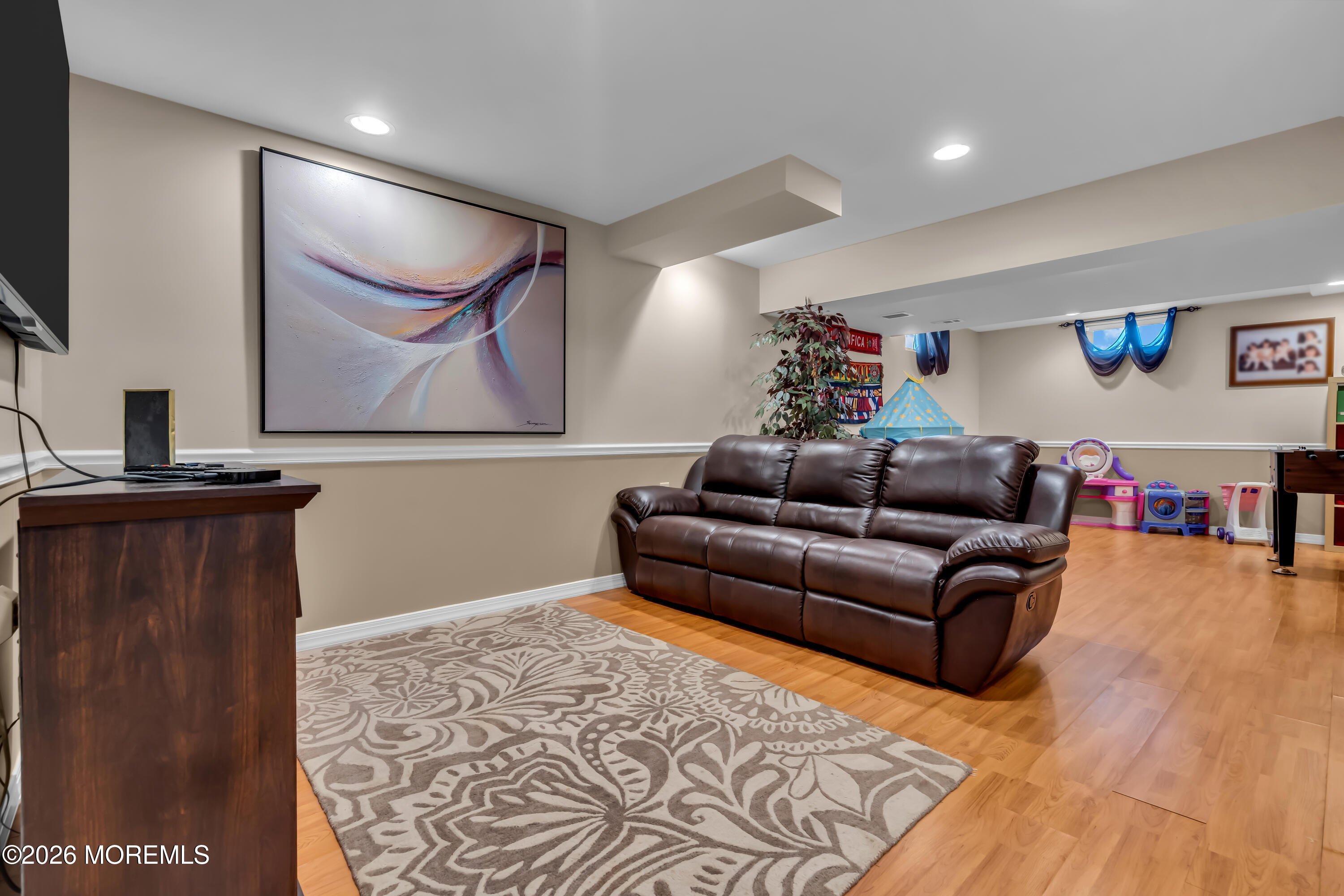 10 Beacon Place Old Bridge, NJ 08857 - Photo 55 of 72 a living room with furniture and a rug