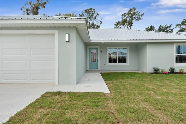 a view of a house with a outdoor space