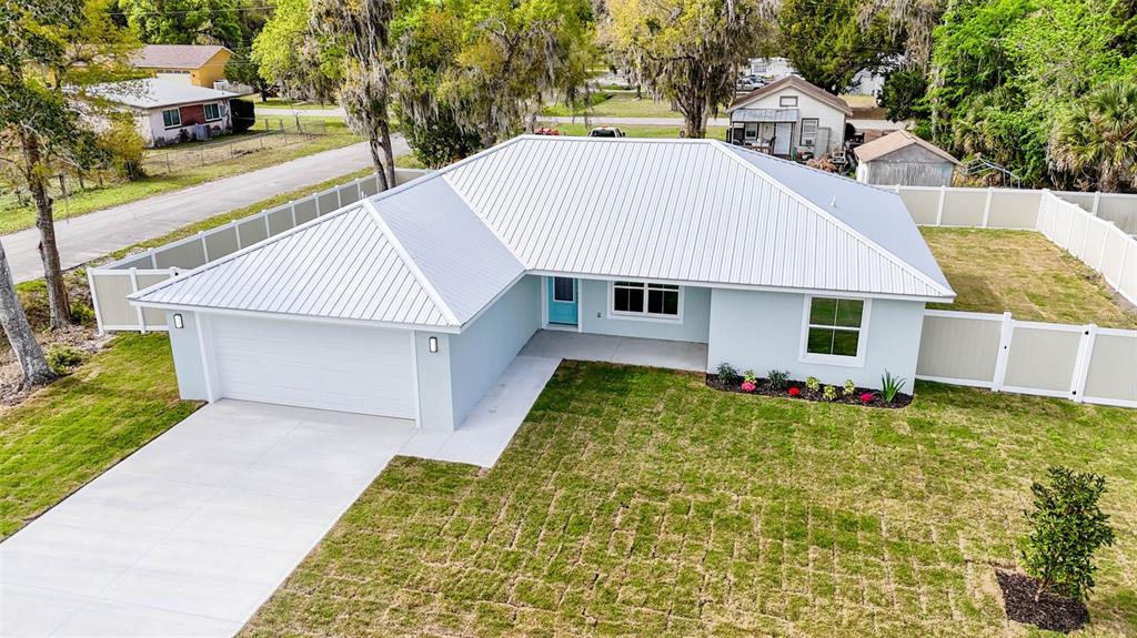 261 South Main Street Bunnell, FL 32110 - Photo 40 of 56 a view of a house with backyard