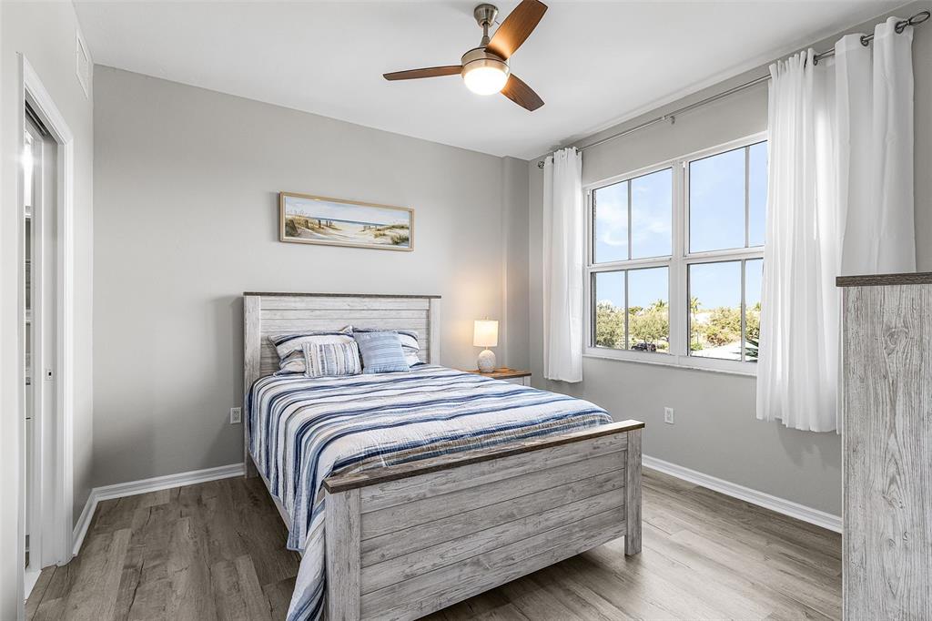 2060 Matecumbe Key Road, Unit 2307 Punta Gorda, FL 33955 - Photo 11 of 45 a bedroom with a bed and a window