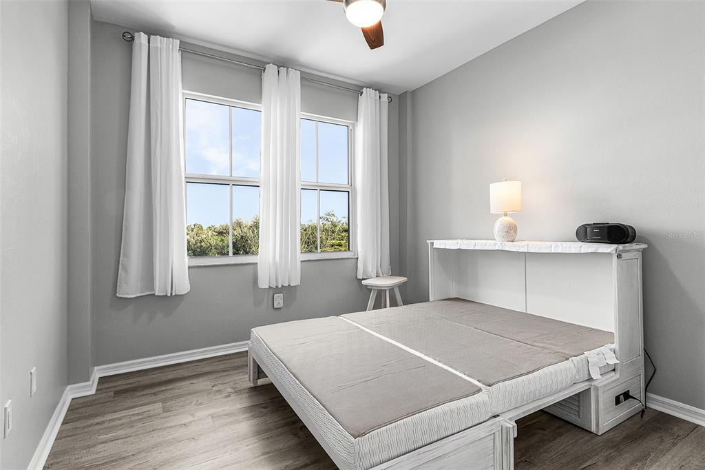 2060 Matecumbe Key Road, Unit 2307 Punta Gorda, FL 33955 - Photo 17 of 45 a bedroom with a bed and window