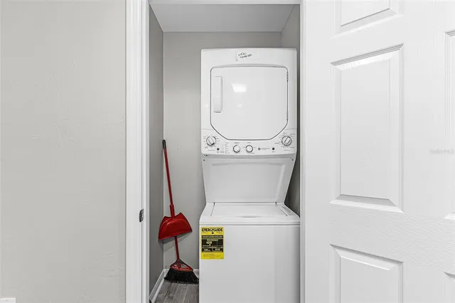 a view of swimming pool with outdoor seating and a flat screen