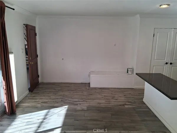 a view of a bathroom with bathtub and shower