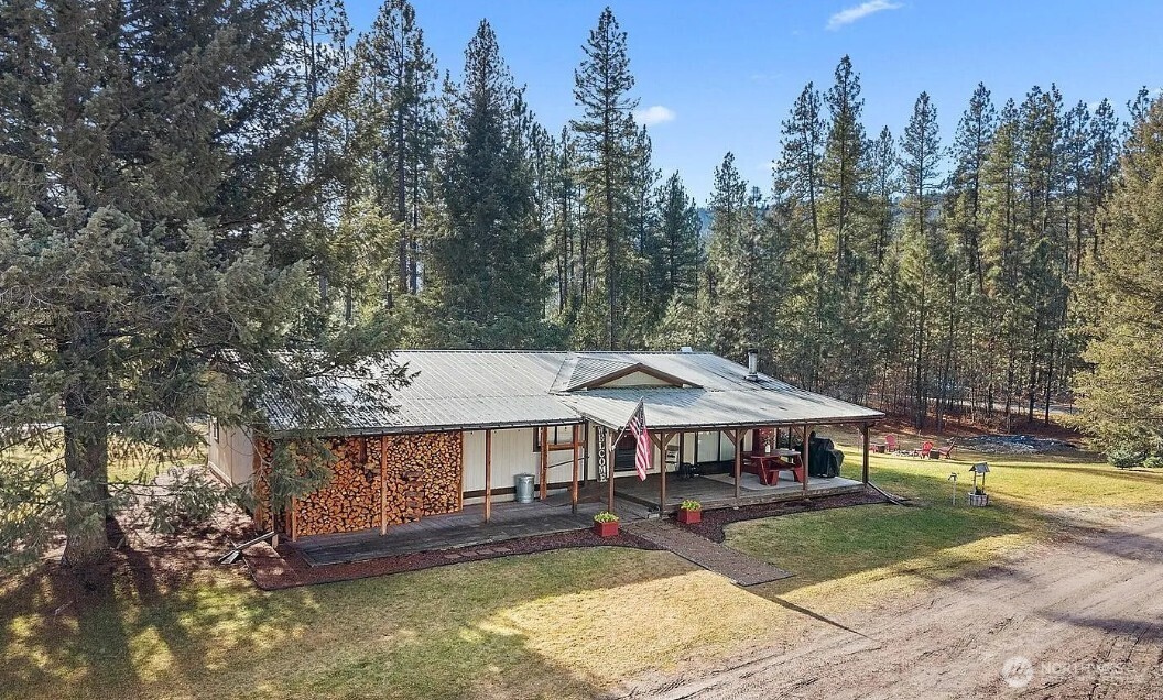 1197B Williams Lake Road, Unit B Evans, WA 99126 - Photo 1 of 1 a view of a house with garden