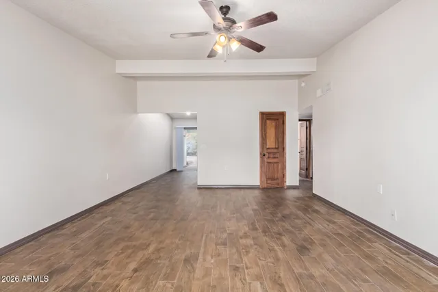 a view of a big room with carpet