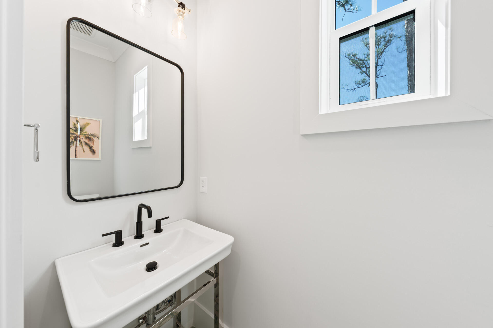 520 South County Highway 393, Unit 39A Santa Rosa Beach, FL 32459 - Photo 14 of 47 a bathroom with a sink and mirror