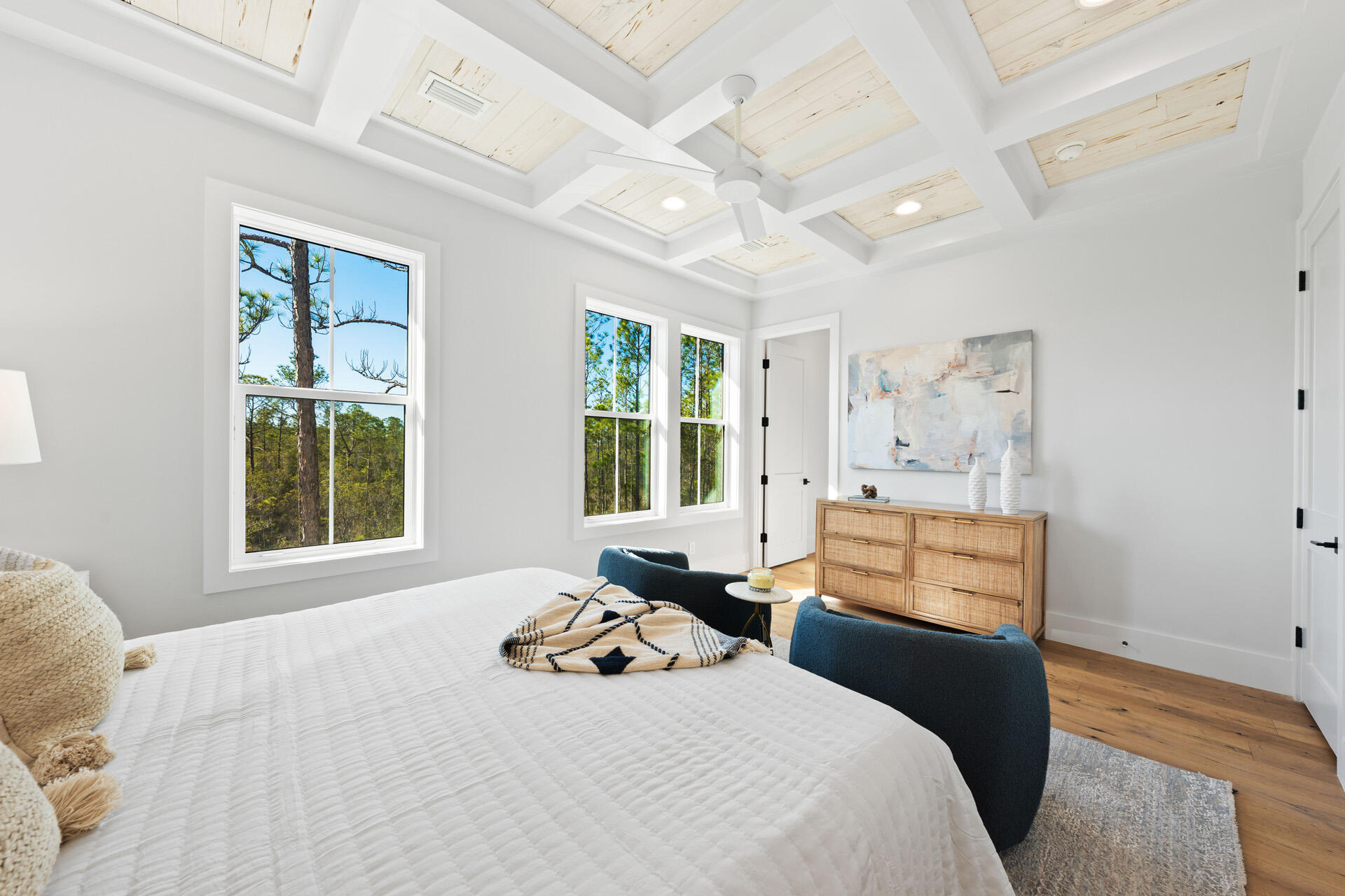 520 South County Highway 393, Unit 39A Santa Rosa Beach, FL 32459 - Photo 18 of 47 a bedroom with a bed and wooden floor